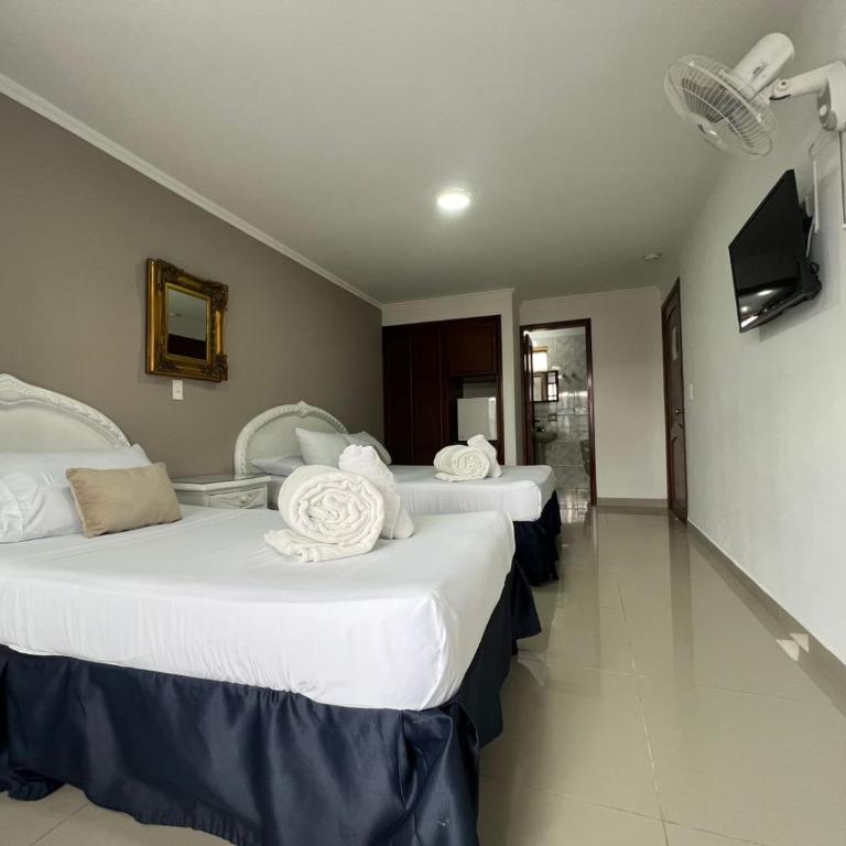 Hotel Suite Santa Rosa - Habitación Cuádruple Estándar - 7