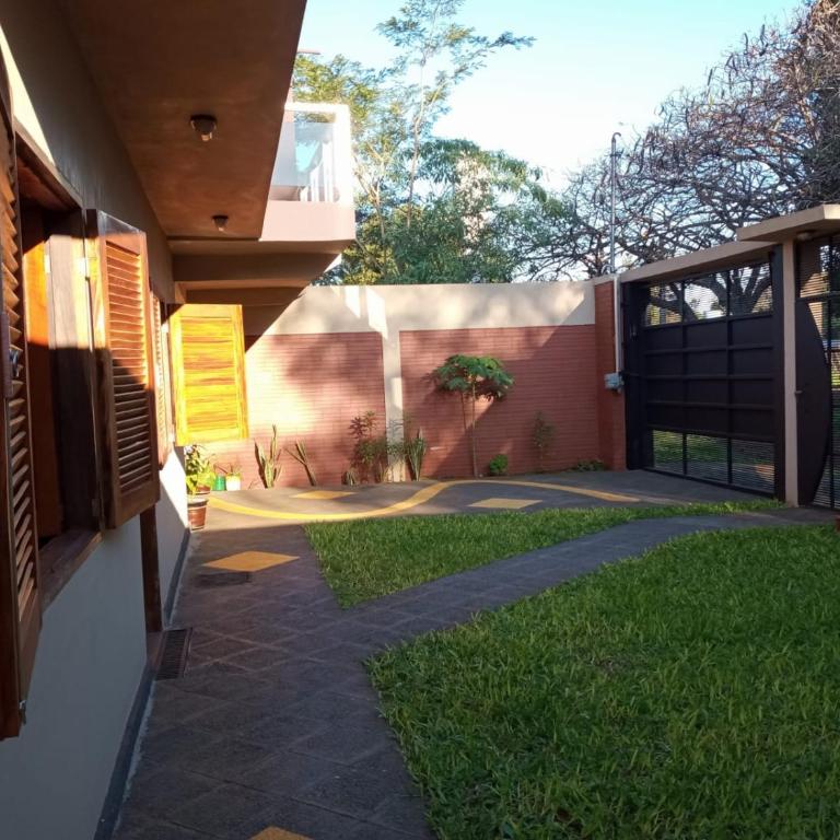 Alojamiento López - Casa Duplex Encarnación - Three-Bedroom House - 7