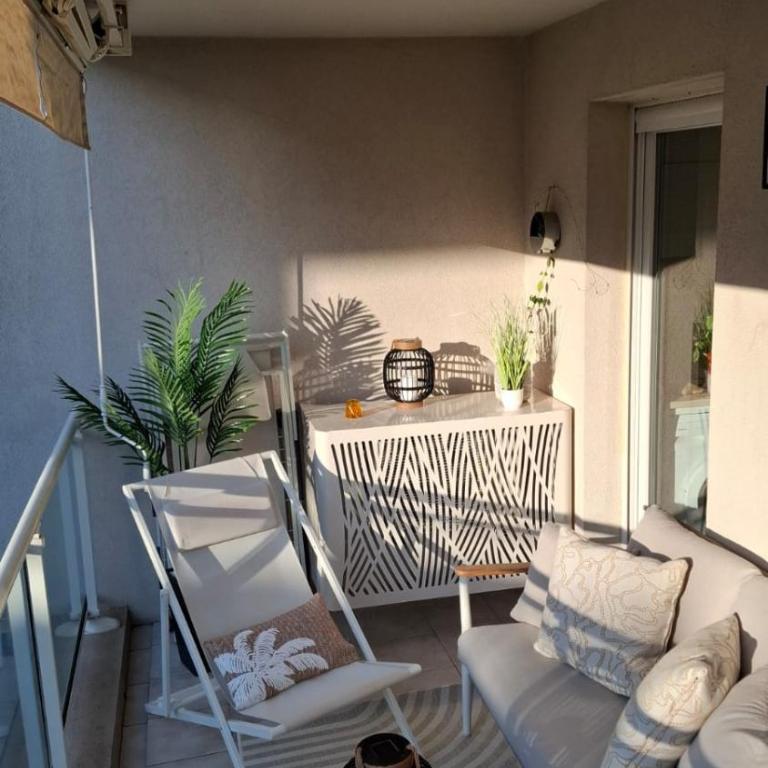 Bel appartement en bord de mer avec piscine lagon et jardin, en résidence sécurisée - Appartement 2 Chambres - 31