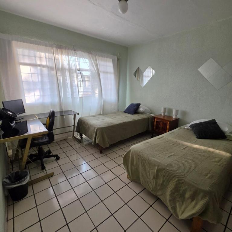 Cozy Apartment in Guadalajara - Perfect for Long Stays & Remote Work - Two-Bedroom Apartment with Pool View - 12