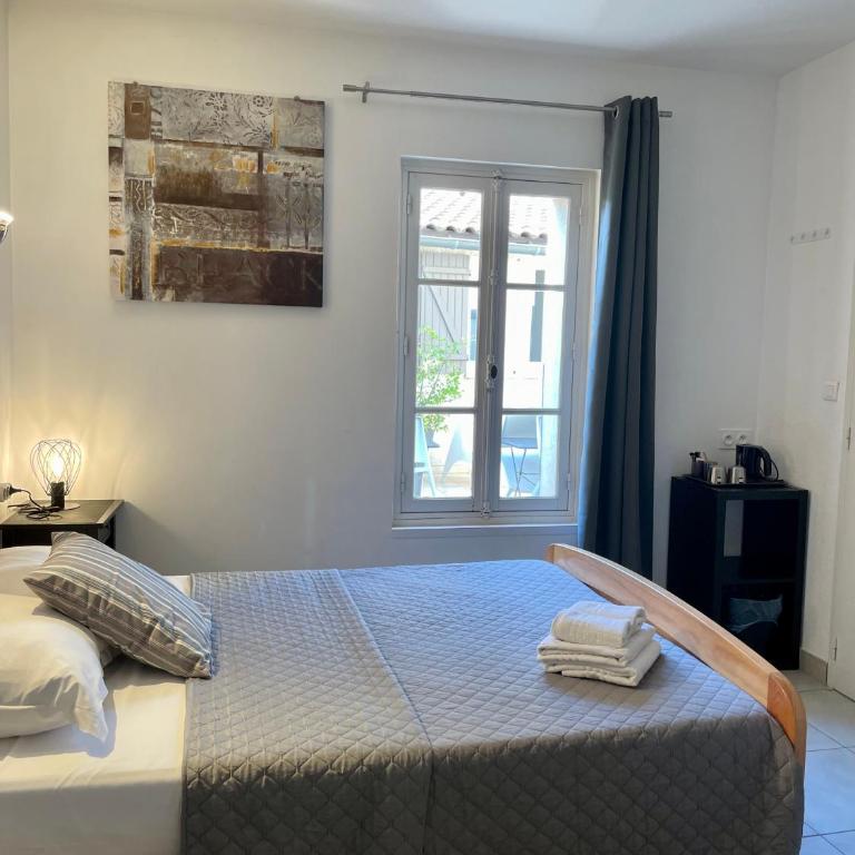 Hotel L'Escale - Chambre Triple - Rez-de-Chaussée - 1