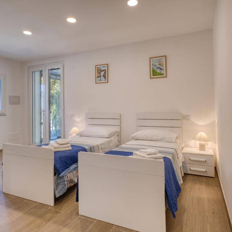 VFH Residence Flavia -Tre Piscine - Appartamento con 2 Camere da Letto, Terrazza e Vista Mare - 16