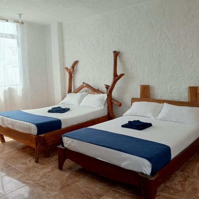 Private room for 4 people, Casa Oasis Galapagos - One-Bedroom Apartment - 7