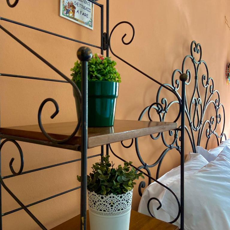 "Little Sicilian Home"-room with a private bathroom & kitchen -fridge - and shared a beautiful terrace on Hostel Taormina Center - One-Bedroom Apartment - 18