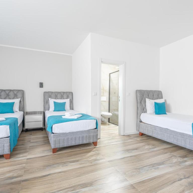 Hotel Mondo - Deluks Četvorokrevetna Soba - 1