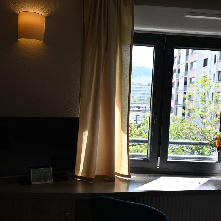 Hotel Les Terrasses - Chambre Triple - Vue sur Jardin - 5