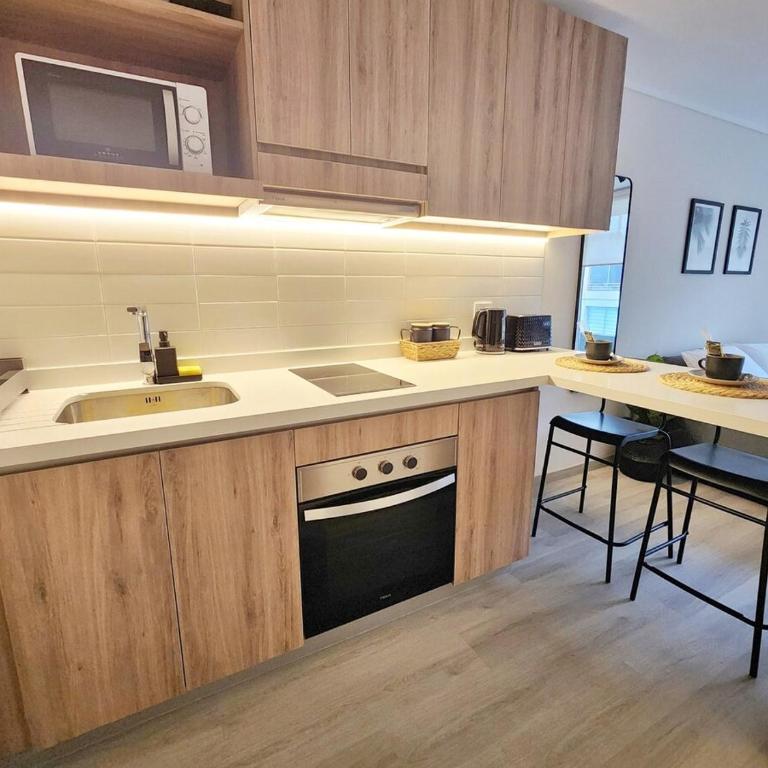 Moderno 1D con parking en Las Condes - Apartamento de 2 dormitorios - 35