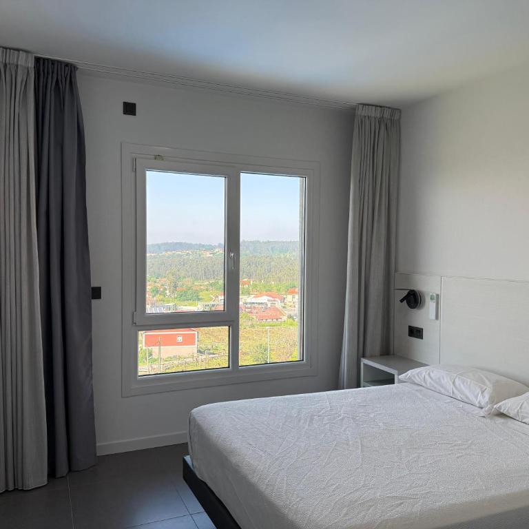Apartamentos Onzamar - Apartamento de 2 dormitorios con vistas al mar - 11