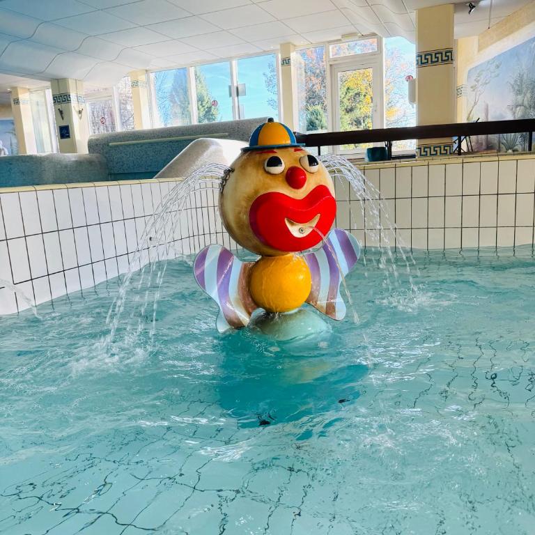 Ferienwohnung Harmonia inklusive Hallenbad, Außenpool, Sauna & Fitnessstudio, familienfreundlich ausgestattet, großes 2-Zimmer-Apartment - Apartment mit 2 Schlafzimmern - 24