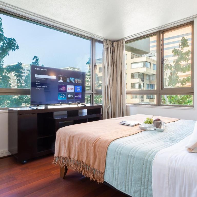 Departamento a pasos del Parque Arauco con piscina en Las Condes con Aire Acondicionado - Two-Bedroom Apartment - 41