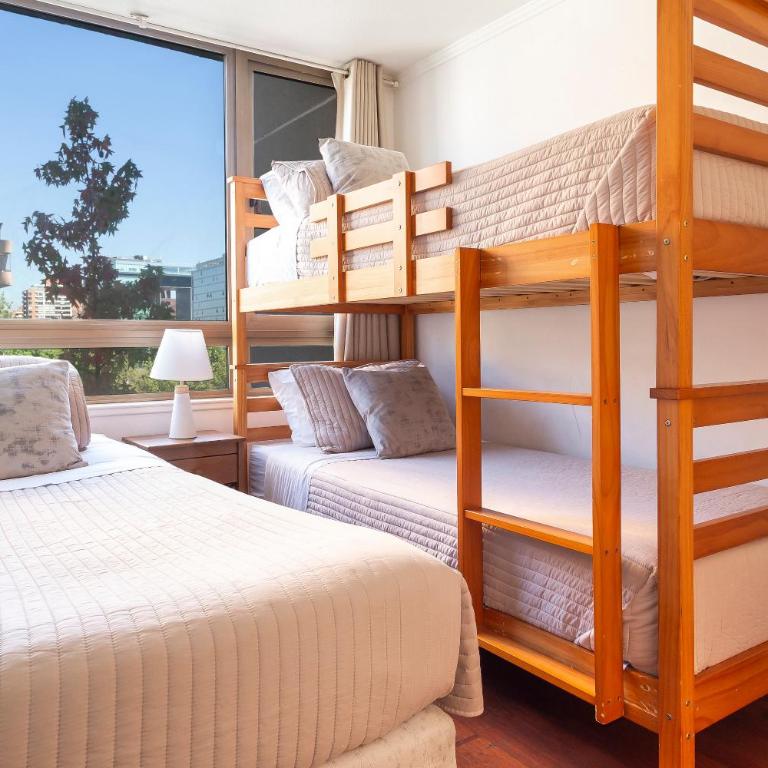 Departamento a pasos del Parque Arauco con piscina en Las Condes con Aire Acondicionado - Two-Bedroom Apartment - 44