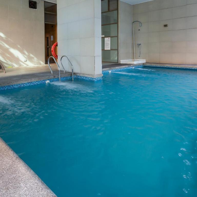 Departamento a pasos del Parque Arauco con piscina en Las Condes con Aire Acondicionado - Two-Bedroom Apartment - 51