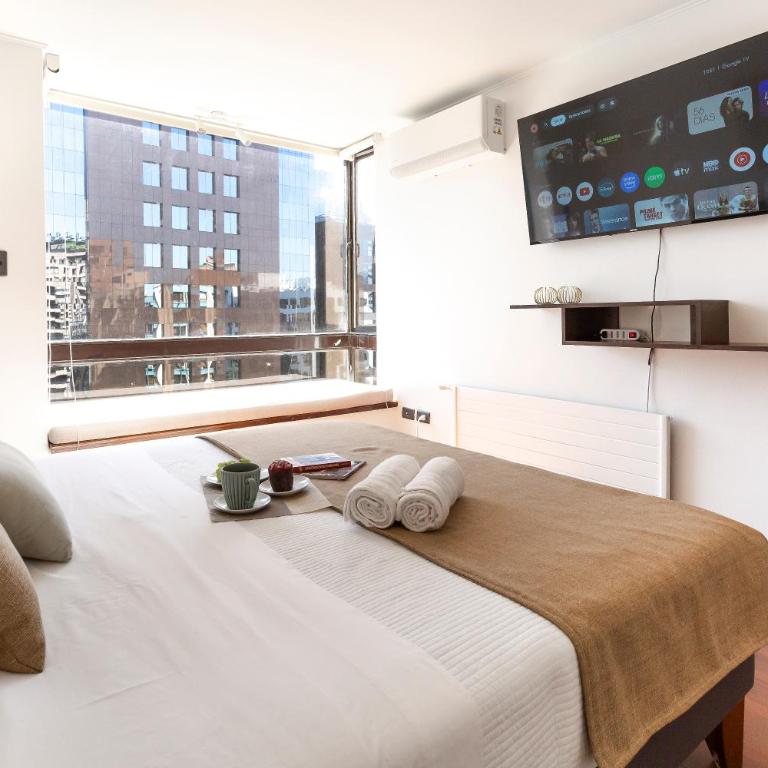 Amplio dpto a pasos del Costanera Center y MUT en Las Condes con Aire Acondicionado - Three-Bedroom Apartment - 25