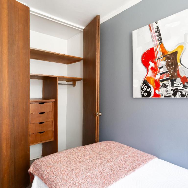 Acogedor departamento en Barrio el Golf con Aire acondicionadoCercano a Costanera Center y MUT - Three-Bedroom Apartment - 31
