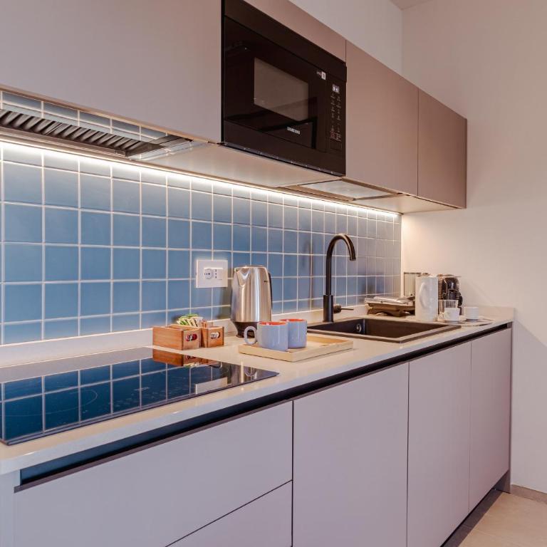 GuestHost -Carducci Attics - Penthouse Apartment - 13