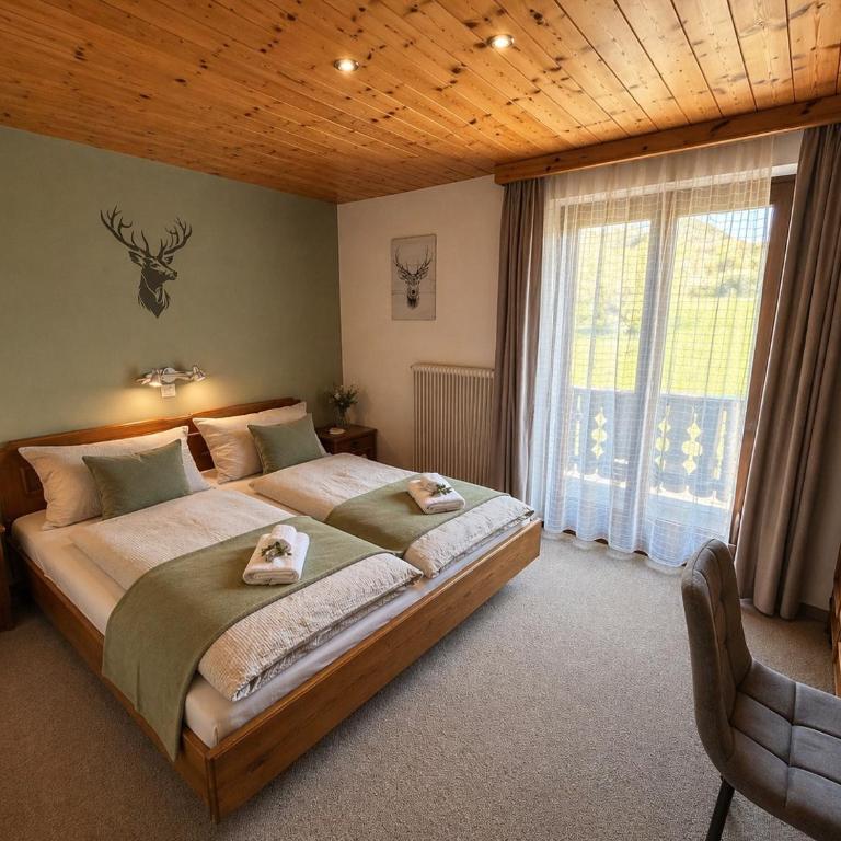 Pension Sonneck - Doppelzimmer mit Bergblick - 8