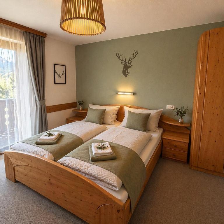 Pension Sonneck - Doppelzimmer mit Bergblick - 9