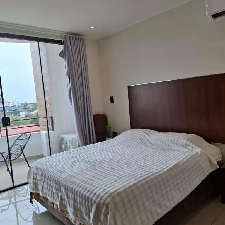 MONOAMBIENTE ACOGEDOR CON BALCON y GARAJE - One-Bedroom Apartment - 25
