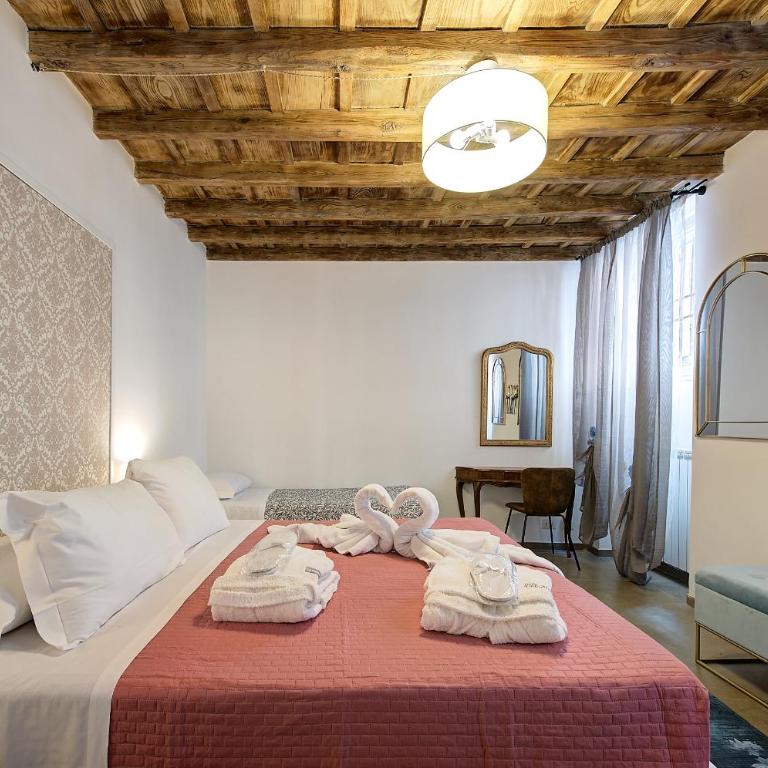 Casa Capocci 68 - Camera Deluxe (2 Adulti + 1 Bambino) - 12