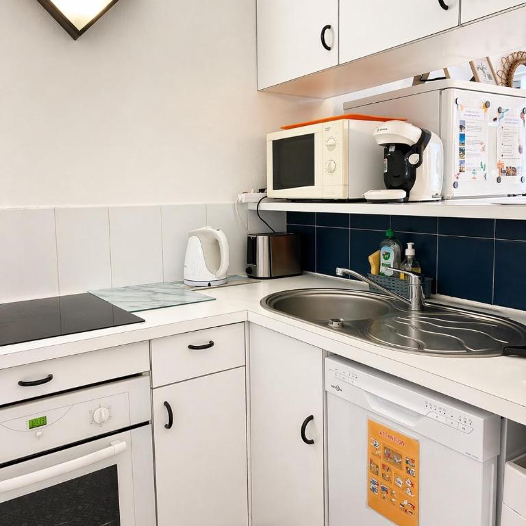 Studio cabine pied dans l eau climatisé, parking et wifi haut débit - Apartamento - 5