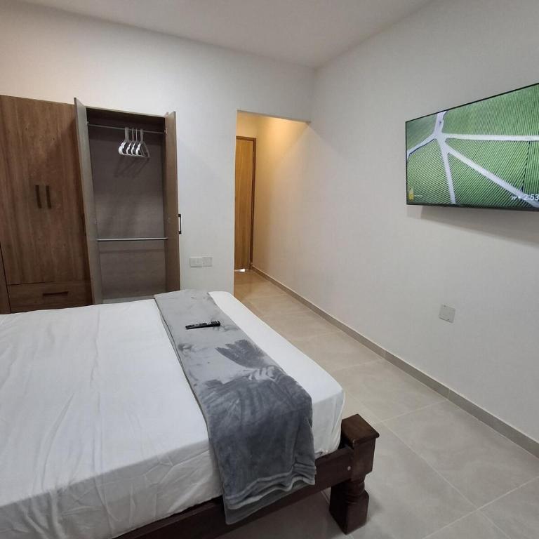 Suite moderna con parqueadero y cocina equipada - Apartamento de 1 dormitorio - 10