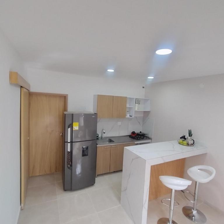 Suite moderna con parqueadero y cocina equipada - Apartamento de 1 dormitorio - 11