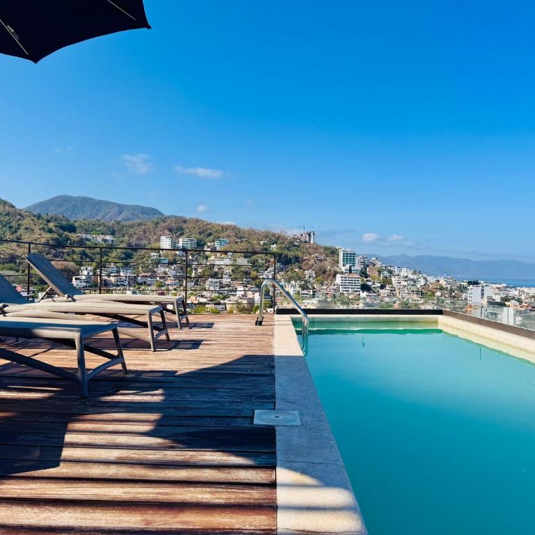 New Designer 2BR w Rooftop Pool, Gym, Stunning Views, 7 min Malecon & Beach - Two-Bedroom Superior Apartment - 1