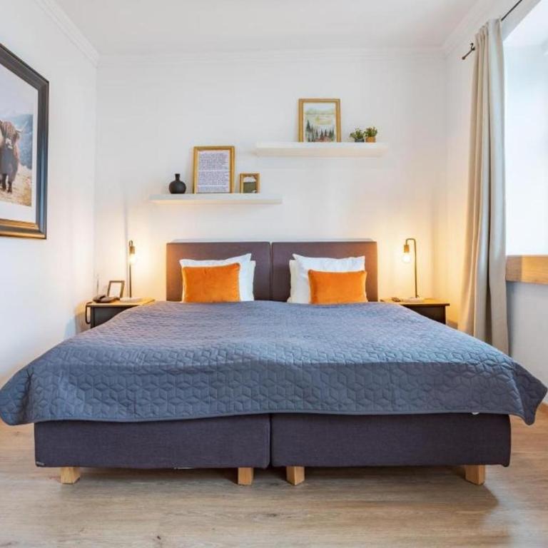 Ski-n-Lake City Apartments - Doppelzimmer mit Seeblick - 7