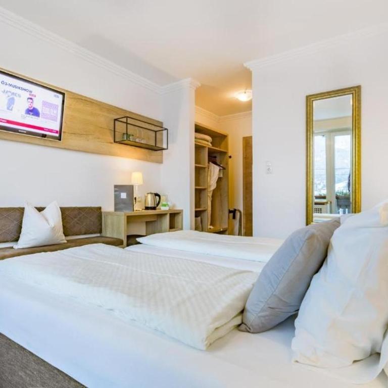Ski-n-Lake City Apartments - Doppelzimmer mit Seeblick - 12
