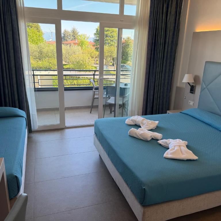 Hotel Residence Holiday - Camera Tripla Premium - 9