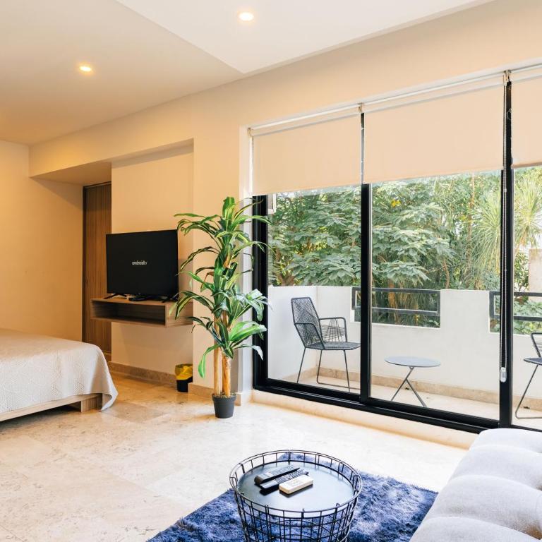 Amplio departamento familiar- Alberca -A pasos de la playa! - Two-Bedroom Apartment with Balcony - 1