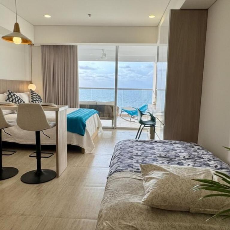 Apartamento con vista al mar, terraza privada y piscina cerca aeropuerto - One-Bedroom Apartment - 4