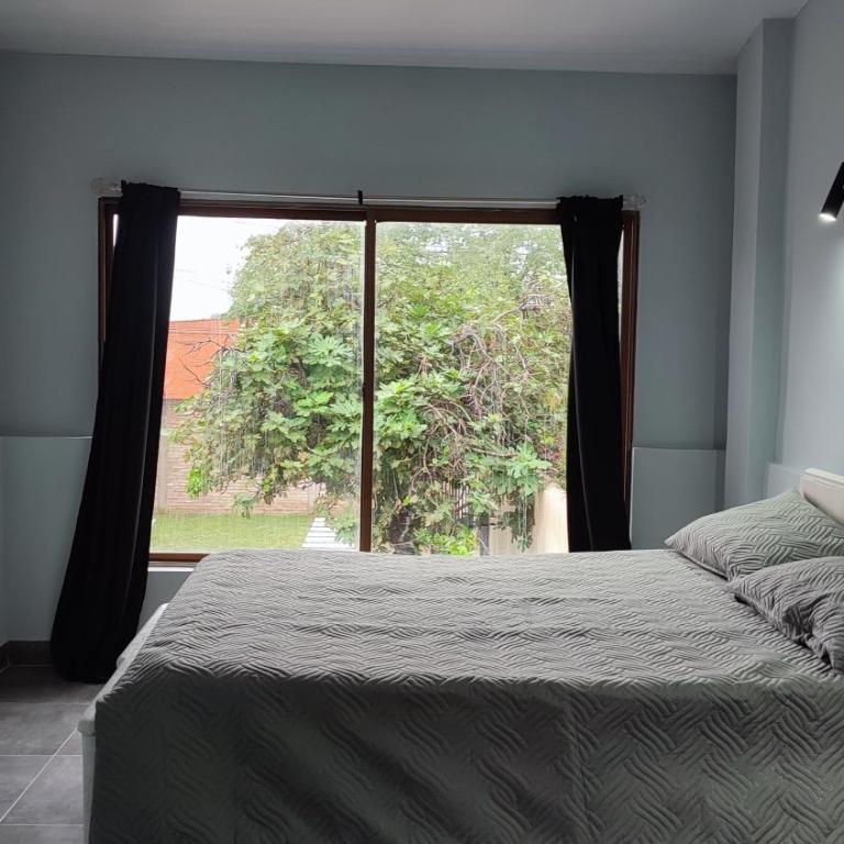 Casa hasta 10 personas a 5 min del estadio, 7min del nodo y 10 min del forum - Two-Bedroom House - 20