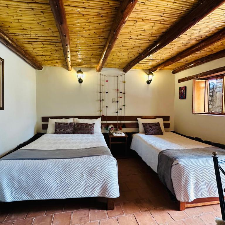 Lodge El Portal de Qopuy - Habitación Triple con vistas a la montaña - 2