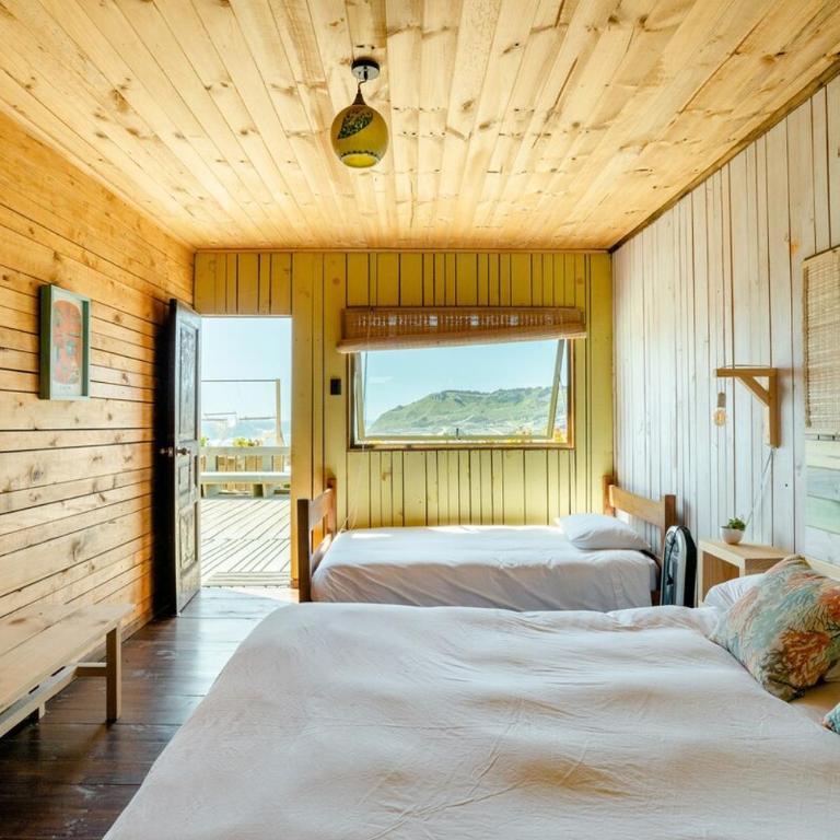 Pupuya Surf House - Three-Bedroom House - 31