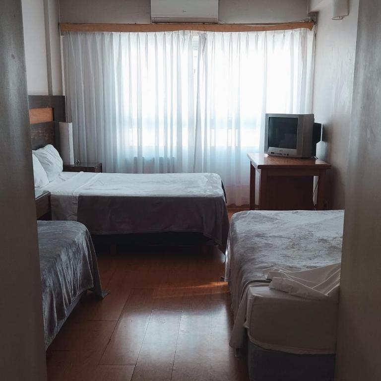 obelisco hoteles - Habitación cuádruple - 10