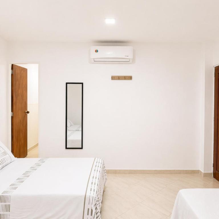 Hotel La Martina - Apartadó Antioquia - Habitación Familiar Estándar - 7