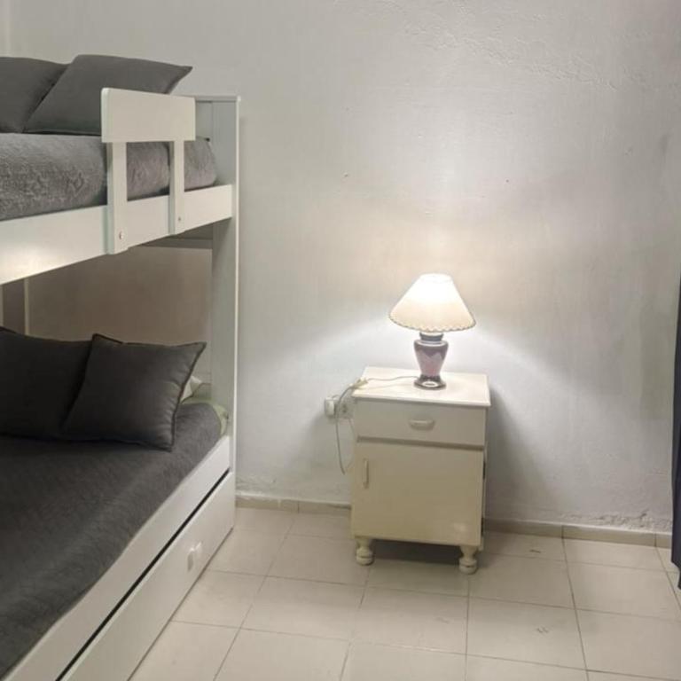 Villa Carlos Paz Departamento a dos minutos de la terminal, de 3 a 7 personas - Apartamento de 3 dormitorios - 6