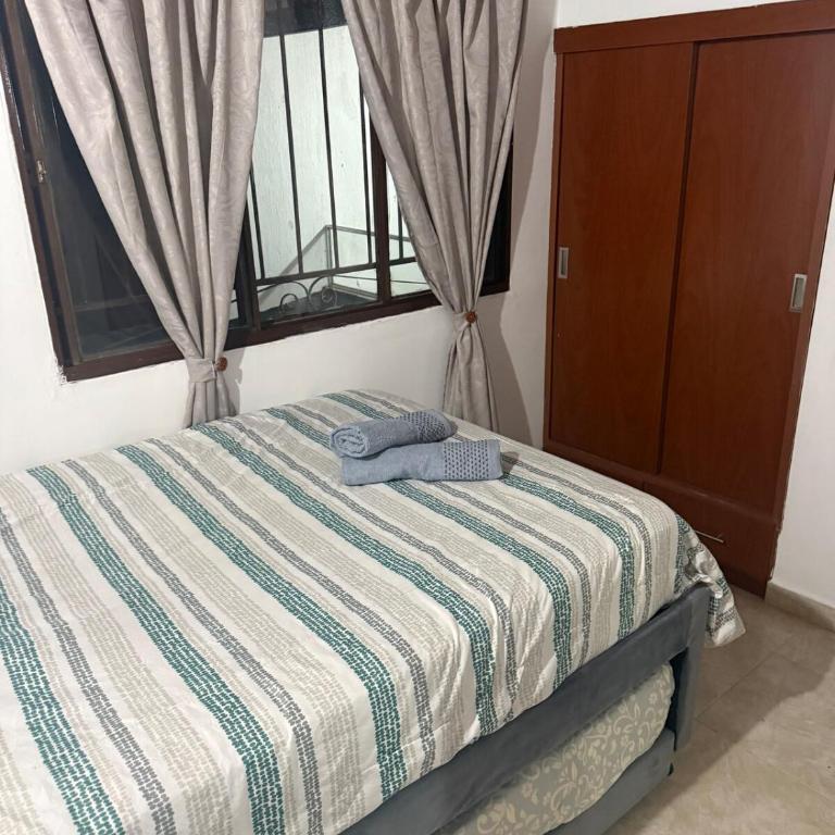 Mi hogar santanderiano - Three-Bedroom Apartment - 17