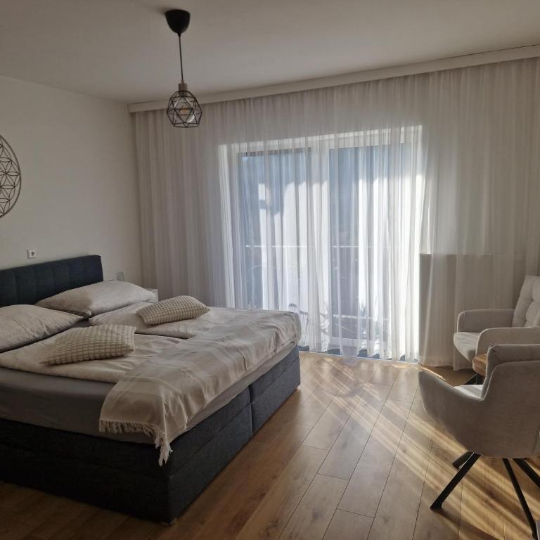 Haus Rupitsch - Apartment mit 1 Schlafzimmer, Balkon und Bergblick - 1