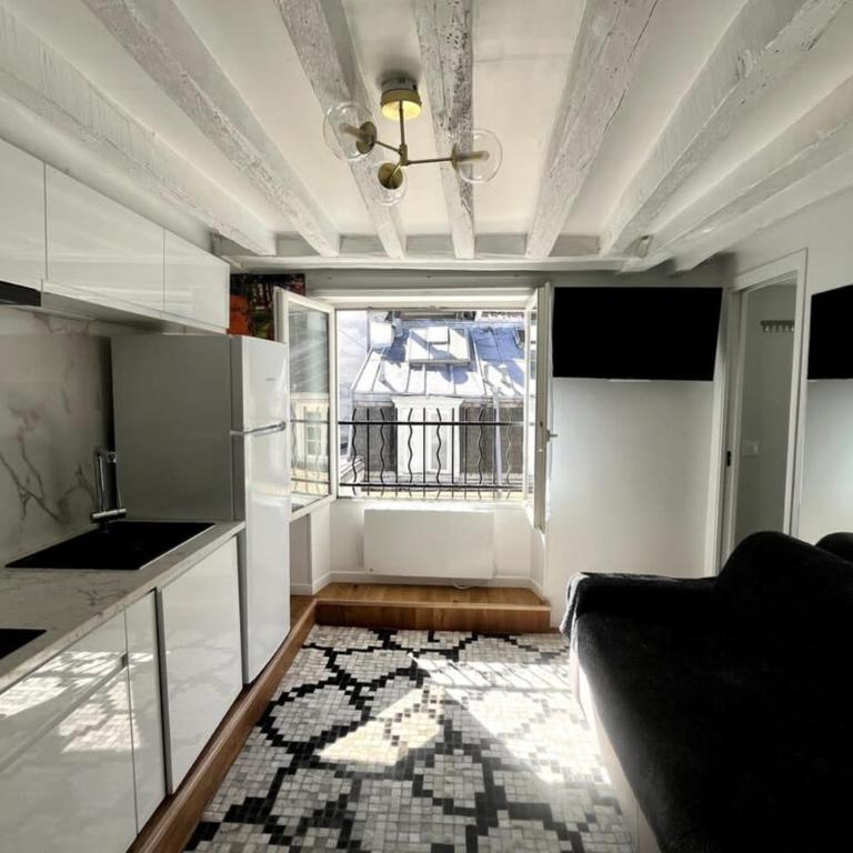 Opéra 9e Studio sous les toits & plein de caractère par Mey Agency - Studio - 4