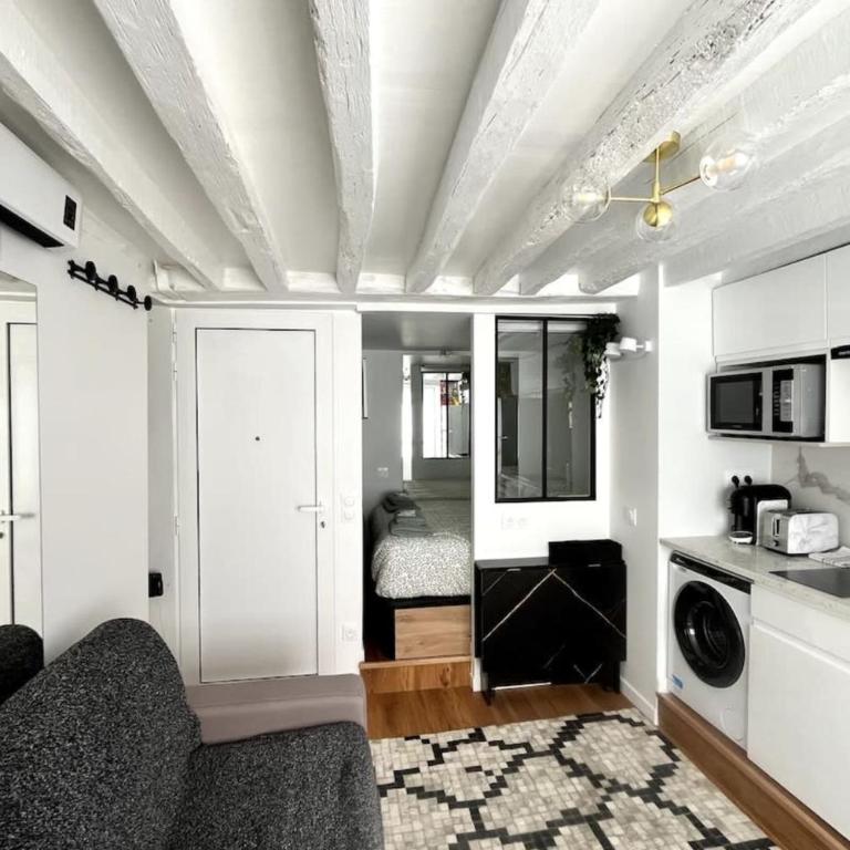 Opéra 9e Studio sous les toits & plein de caractère par Mey Agency - Studio - 5