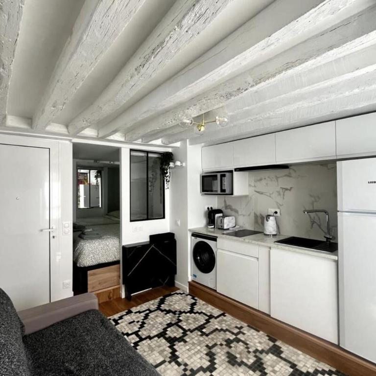 Opéra 9e Studio sous les toits & plein de caractère par Mey Agency - Studio - 8