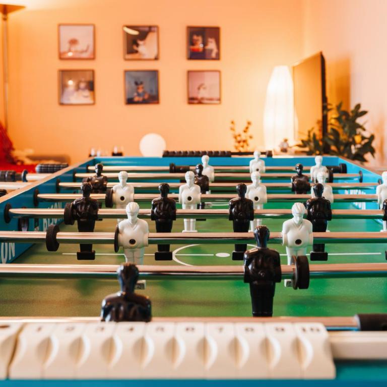 Roof Shelter with Balcony City View Foosball - Three-Bedroom Apartment with Balcony - 22