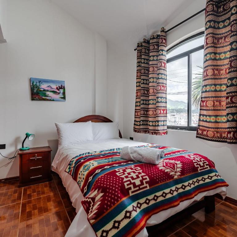 Casa junto al Mercado Copacabana centro de Otavalo - Three-Bedroom House - 12