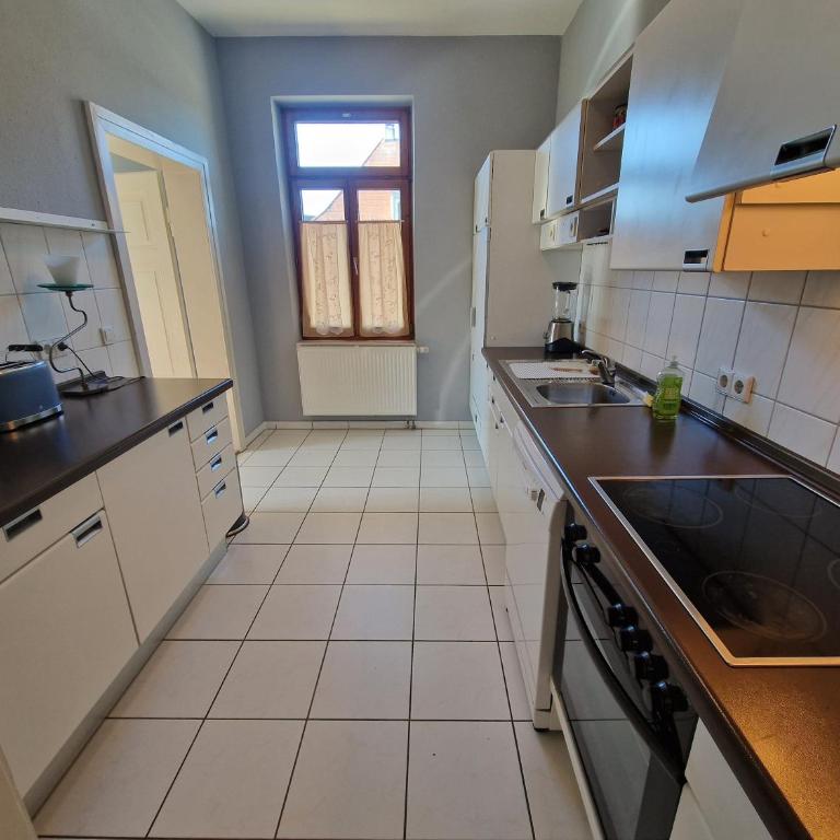 Ferienwohnung am Schlossplatz - Deluxe-Apartment mit 2 Schlafzimmern und Gartenblick - 26