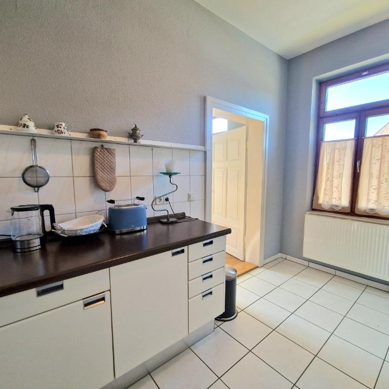 Ferienwohnung am Schlossplatz - Deluxe-Apartment mit 2 Schlafzimmern und Gartenblick - 27