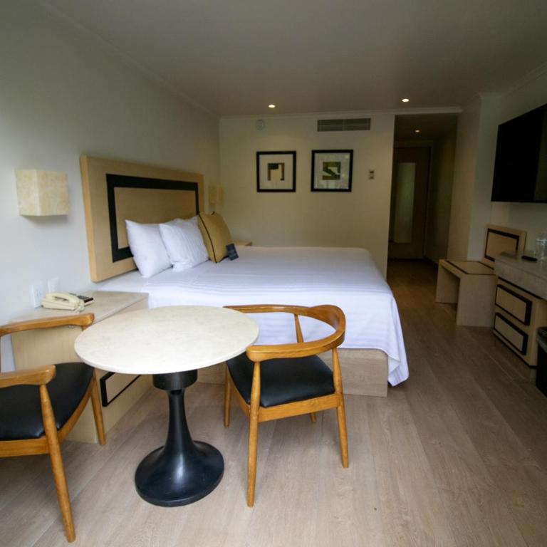 Hotel Stella Maris - Habitación Doble Deluxe - 2 camas dobles - 3