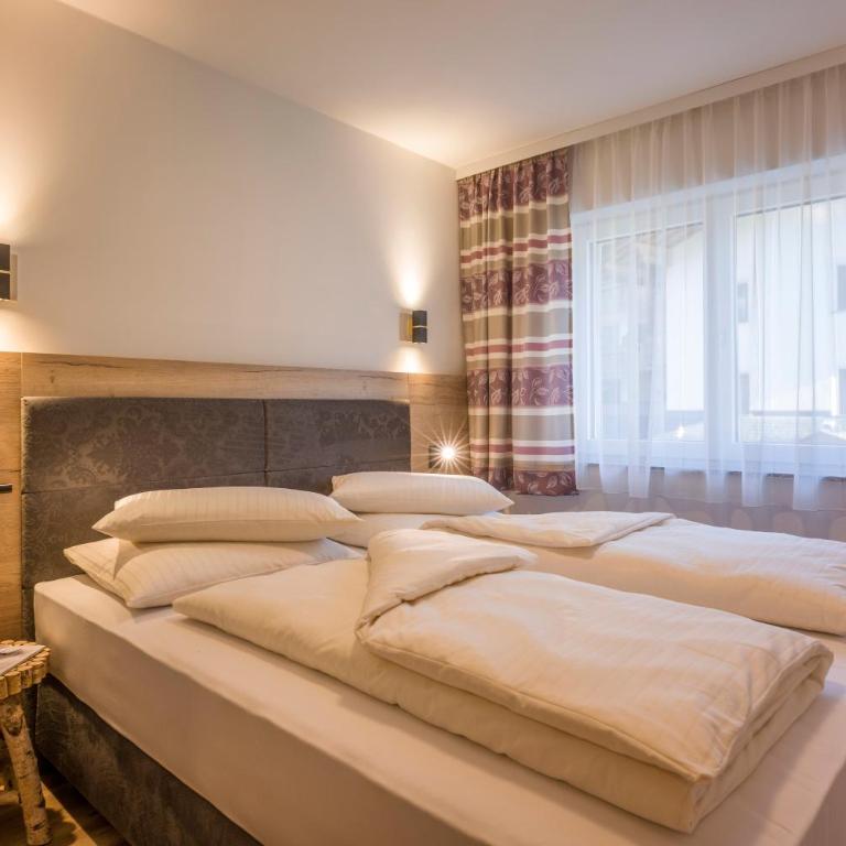 Aparthotel AlpTirol - Apartment mit 3 Schlafzimmern (Dorfplatzl) - 9
