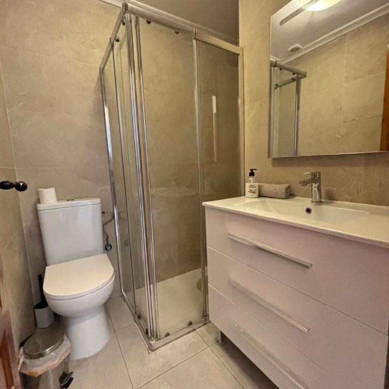 Apartamento con jardín, piscina y parking - Apartamento de 2 dormitorios - 13